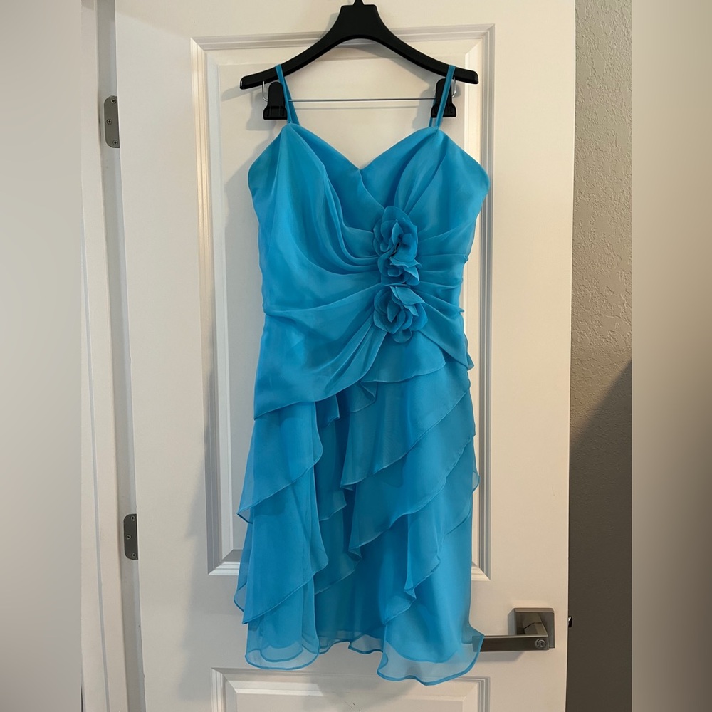 Impression Bridal size 12 strapless dress turquoise with removable straps.